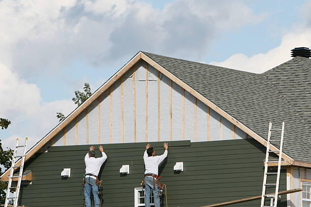 Professional Storm Damage Siding Repair technician working in Audubon, PA